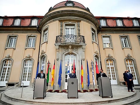 German Foreign Minister Heiko Maas, center, Foreign Minister of the United Arab Emirates Abdullah bin Zayed Al Nahyan, left, and Foreign Minister of Israel Gabi Ashkenazi, right, speak at a press conference after their meeting in front of Villa Borsig, Tuesday, Oct. 6, 2020, in Berlin, Germany