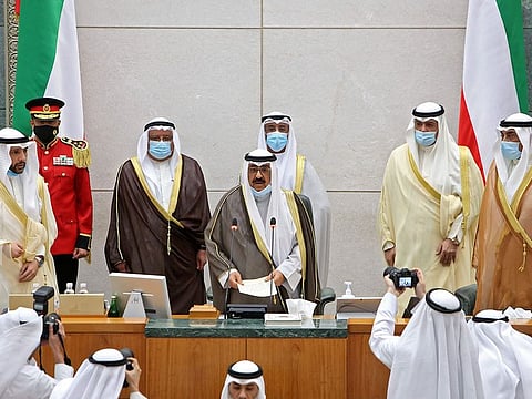 The new Kuwaiti crown prince Sheikh Meshal al-Ahmad al-Jaber Al-Sabah (C) speaks as he takes the oath at the parliament on October 8, 2020 in Kuwait City