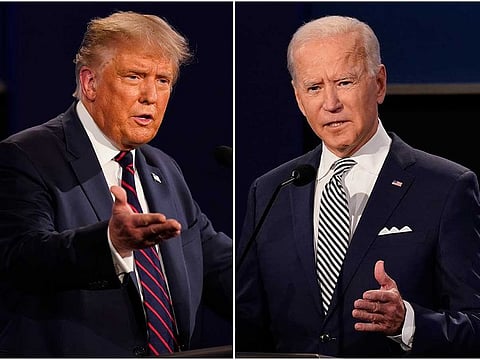 This combination of Sept. 29, 2020, photos shows President Donald Trump, left, and former Vice President Joe Biden during the first presidential debate at Case Western University and Cleveland Clinic, in Cleveland, Ohio.