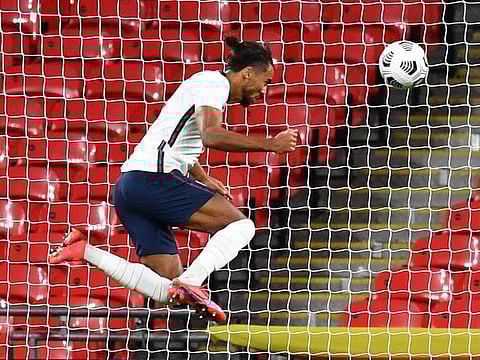 England's Dominic Calvert-Lewin scores their first goal against Wales at Wembley.