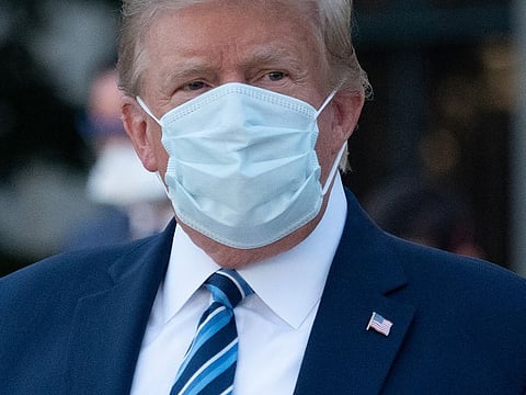 US President Donald Trump leaves Walter Reed Medical Center in Bethesda, Maryland.