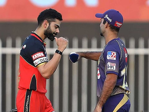 Virat Kohliof Royal Challengers Bangalore and Dinesh Karthik of Kolkata Knight Riders played in the IPL in the UAE last year