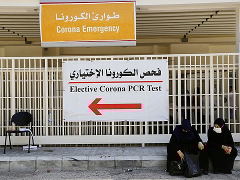 Women wait to get tested for the coronavirus disease at Rafik Hariri University Hospital in Beirut, Lebanon October 1, 2020.
