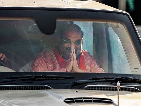 India's Home Minister Amit Shah arrives at Sardar Vallabhbhai Patel International Airport in Ahmedabad, Tuesday, Oct. 13, 2020