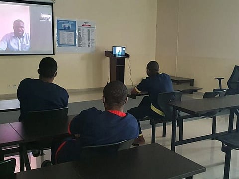 Sharjah jail inmates attend a training session.