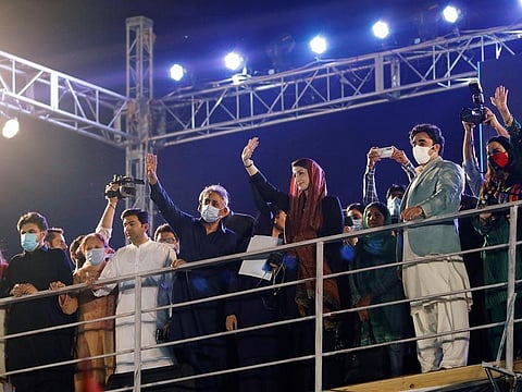 Maryam Nawaz, the daughter of Pakistan's former Prime Minister Nawaz Sharif and Bilawal Bhutto Zardari, chairman of the Pakistan Peoples Party (PPP) are seen during an anti-government protest rally organized by the Pakistan Democratic Movement (PDM), an alliance of political opposition parties, in Karachi, Pakistan October 18, 2020.