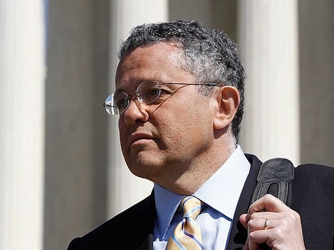 CNN legal analyst Jeffrey Toobin leaves the Supreme Court after it finished the day's arguments on the health care law signed by President Barack Obama in Washington, on March 27, 2012. Toobin has been suspended by the New Yorker and is stepping away from his job as CNN’s senior legal analyst pending what the cable network is calling a “personal matter.”
