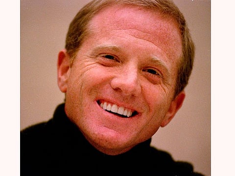 James Redford, son of actor Robert Redford, laughs during a press conference on Nov. 18, 1998.