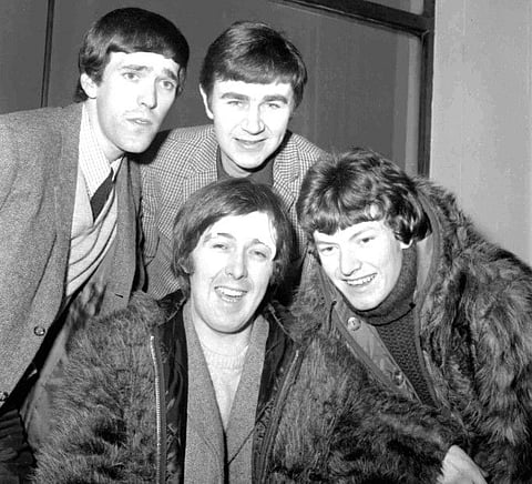 Image shows members of The Spencer Davis Group, a British rock band. From top left: Muff Winwood, Pete York and Steve Winwood. At the bottom of the picture is Spencer Davis who wears a plaster on his forehead following a car accident. London, January 10, 1966.