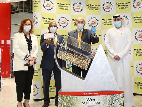 The lucky winner being picked at the latest DDF draw