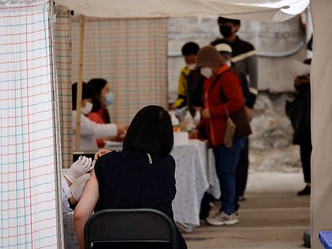 A woman gets an influenza vaccine at a hospital in Seoul, South Korea, October 21, 2020.