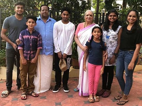 KKV Dharan, 77, a UAE resident for 57 years, with his family.