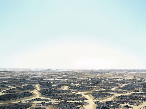 File picture shows a huge blaze at a scrap tyre graveyard being put off in Al Jahra, Kuwait. The city recorded 50 degrees Celsius on Sunday.