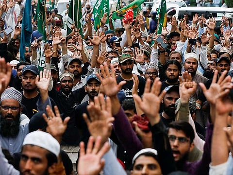 Protesters in Pakistan chant slogans against the satirical French weekly newspaper Charlie Hebdo, during a demonstration in Karachi, Pakistan September 4, 2020.