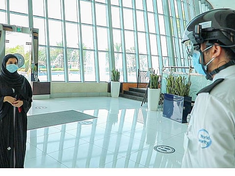 Security personnel across DSO wear a smart helmet to screen temperatures