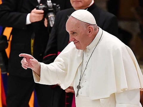 Pope Francis gestures at the end of weekly general audience in the Paul VI hall at the Vatican on October 28, 2020.
