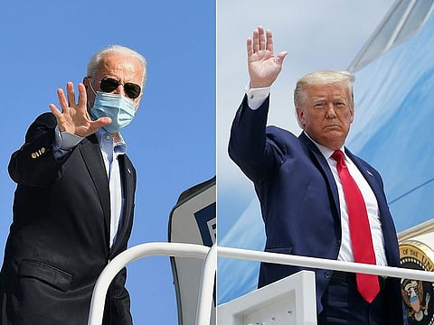 Democratic presidential candidate Joe Biden waving as he boards his plane in New Castle, Delaware, on October 22, 2020 and US President Donald Trump boarding Air Force One as he departs from Joint Base Andrews in Maryland on May 30, 2020.