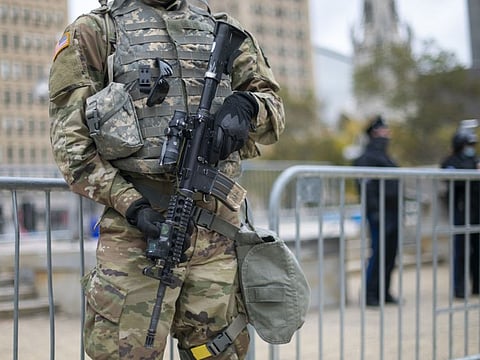 A member the National Guard monitors activity surrounding Philadelphia City Hall on October 30, 2020 in Philadelphia, Pennsylvania.