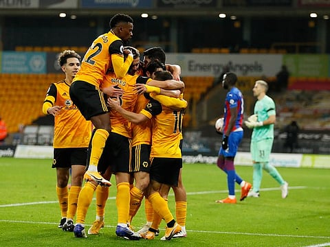 Wolves beat 10-man Crystal Palace 2-0