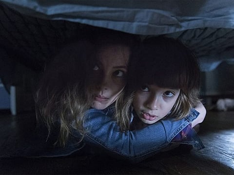 Gillian Jacobs and Azhy Robertson in 'Come Play'.