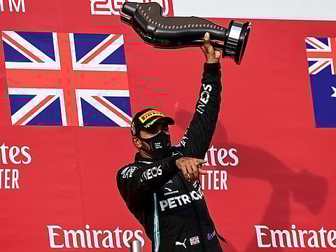Lewis Hamilton celebrates at Imola