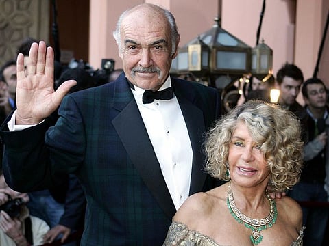 In this file photo taken on December 07, 2004 British actor Sean Connery and his wife, Micheline Roquebrune, arrive for the presentation of "Alexendre," directed by Oliver Stone, during the 44th International Film Festival in Marrakesh.
