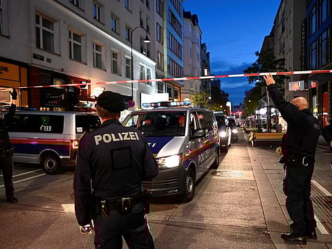 Police officers block a street after exchanges of gunfire in Vienna, Austria November 3, 2020