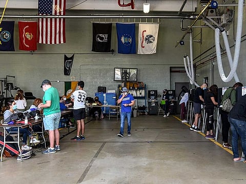 Voters cast their ballots at the Indian Creek Fire Station 4 in Miami, Florida on November 3, 2020.