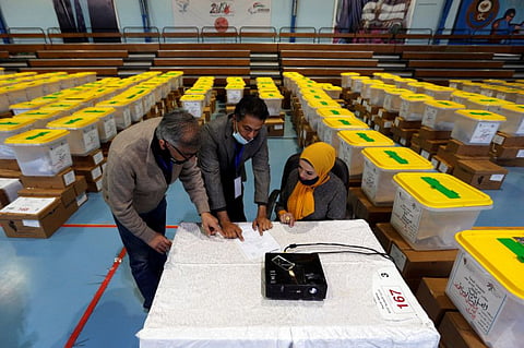 Jordanian election officials check ballot boxes for the parliamentary elections which will be held on November 10, amid fears over rising number of the coronavirus cases, at a vote counting center in Amman, Jordan November 8, 2020.