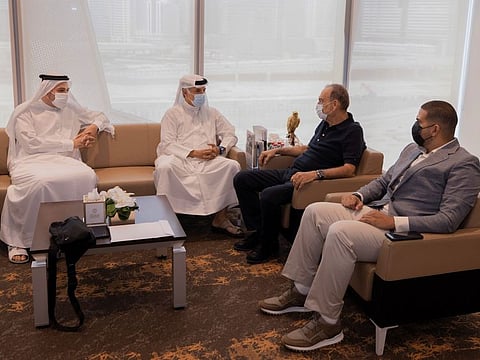 Avram Grant (third left) in discussion with Saeed Hareb and Nasser Aman Al Rahma of Dubai Sports Council on Tuesday.