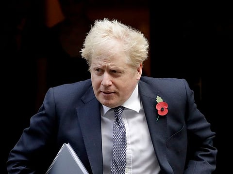 British Prime Minister Boris Johnson leaves 10 Downing Street in London on Tuesday.