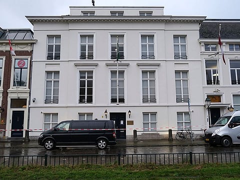 Dutch police roped off the area around Saudi Arabia's embassy, center, in The Hague, Netherlands, Thursday, Nov. 12, 2020, after several shot were fired at the building early in the morning. Nobody was injured and police were investigating.
