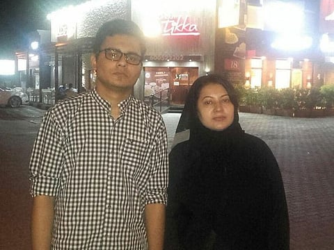 The missing woman, Qurat-ul-Ain, with her son Umaid Ali.