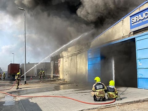 The fire erupted two warehouses at 11:34pm in Ras Al Khor Industrial area.