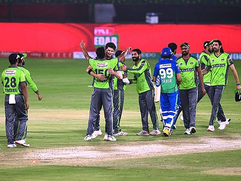 Members of Lahore Qalandars team in jubilation after beating Multan Sultans to seal a final berth in Pakistan Super League on Monday. David Weise, the South African allrounder and Man of the Match, can be seen on the extreme right.