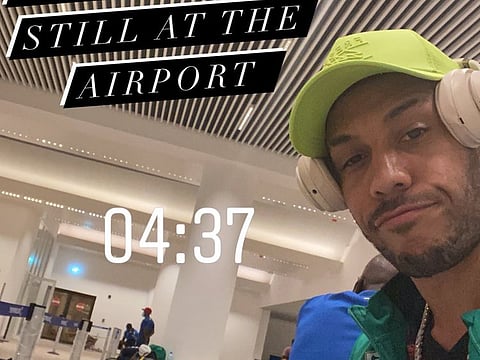 Pierre-Emerick Aubameyang tweeted that he was stuck at the airport in Gambia.