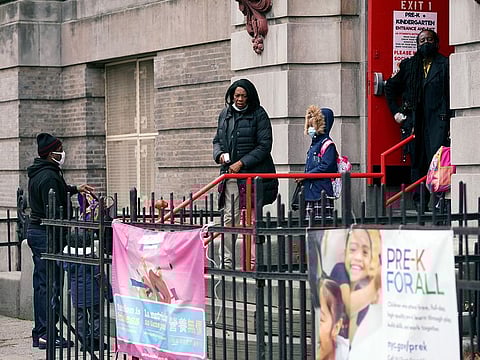 Students arrive at school in Brooklyn on Tuesday, Nov. 17, 2020.