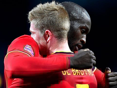 Belgium's Kevin De Bruyne celebrates with Romelu Lukaku after scoring.