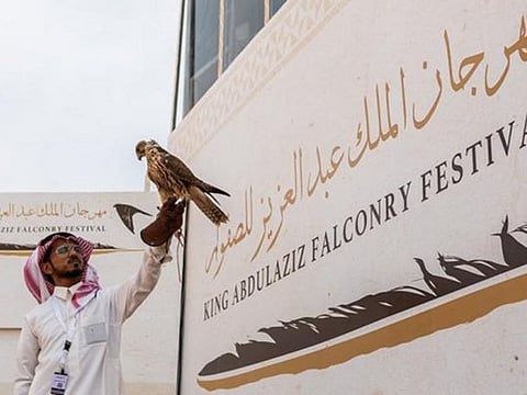 A poster for the King Abdulaziz Falconry Festival.