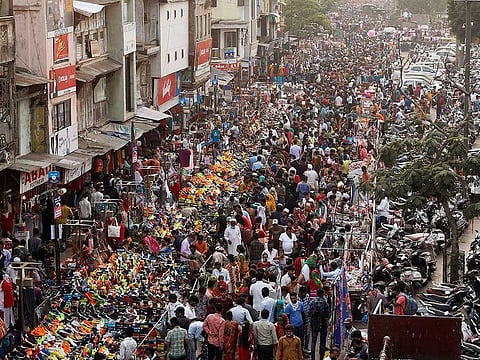 A massive crowd shopping at a market in Ahmedabad in a file picture