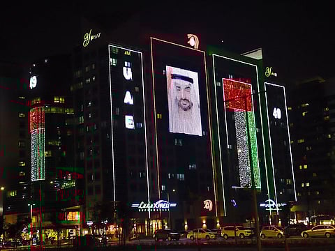 Buildings in Abu Dhabi lit up for the upcoming UAE National Day.