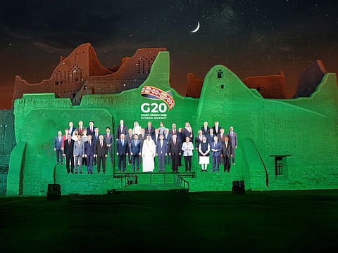 Family Photo composite for the annual G20 Leaders' Summit is projected onto Salwa Palace in Al Turaif, one of the country's UNESCO World Heritage sites, in Diriyah, Saudi Arabia, November 20, 2020.