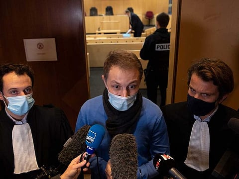 French actor Rachid Hami (C), brother of Jallal Hami, a student officer dead by drowning during a presumed hazing night at the Saint-Cyr Coetquidan military school in 2012, speaks to journalists next to his lawyers prior to the trial of seven French soldiers who appear before court for manslaughter, on November 23, 2020 at the courthouse in Rennes.