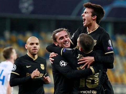 Barcelona's Antoine Griezmann celebrates scoring their fourth goal.