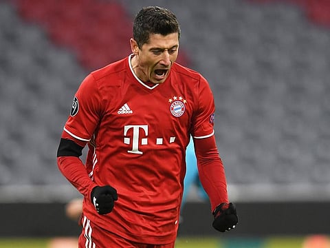 Bayern Munich's Robert Lewandowski celebrates scoring their first goal.