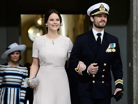In this file photo taken on April 30, 2016 Sweden's Princess Sofia and Prince Carl Philip arrive for the Te Deum thanksgiving service in the Royal Chapel during King Carl XVI Gustaf of Sweden's 70th birthday celebrations in Stockholm.
