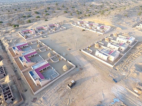 Aerial view of a village developed to resettle local Thari people displaced due to the coal mining project in Thar Block-II in Islamkot area of Tharparkar.