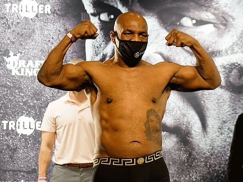 Mike Tyson said he was ''very happy'' to go the eight rounds in his comeback fight against Roy Jones Jr on Saturday.