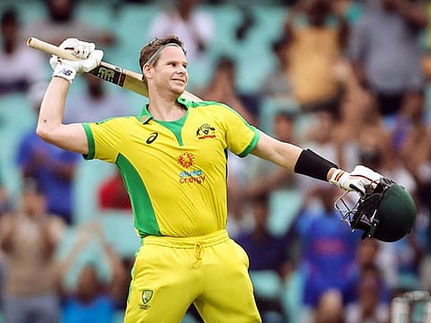 Steve Smith of Australia celebrates his century during the Second ODI against India at the Sydney Cricket Ground.