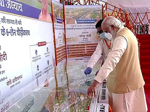 Prime Minister Narendra Modi inaugurates six-lane widening project of Handia (Prayagraj)-Rajatalab (Varanasi) section of National Highway 19, in Varanasi on Monday, November 30, 2020. Uttar Pradesh CM Yogi Adityanath was also present.
